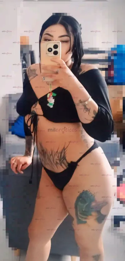 Foto número 6: Esta imagén muestra el cuerpo de una prepago en Colombia